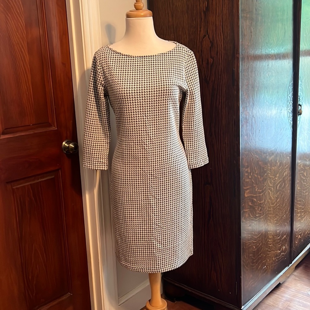 Dress— just above knee length.